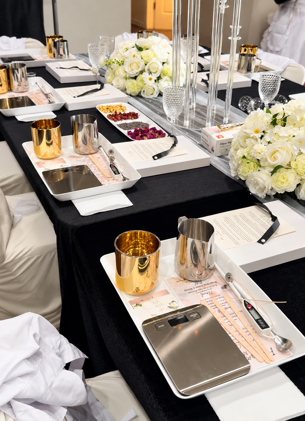 Candle-making party table prepared for guests
